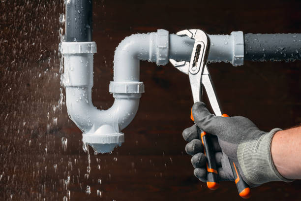 Professional Plumbing technician working in Munford, AL
